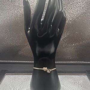 Heart Bracelet Adjustable between our six to a 7 1/2 wrist